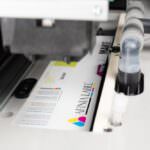 Afinia Label X350 Inkjet label press under printhead print zone